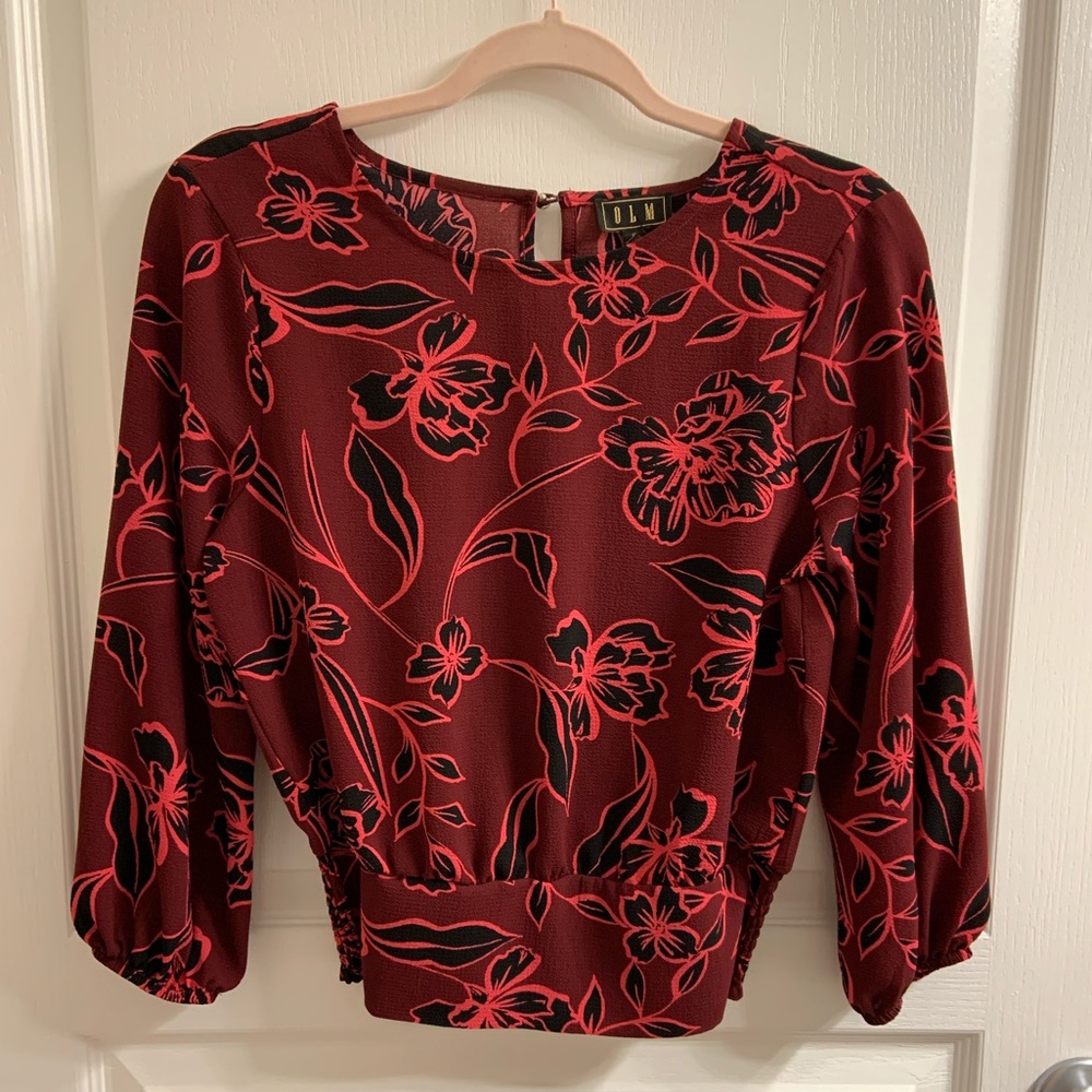 Reddish/Burgundy blouse w/black flower detail